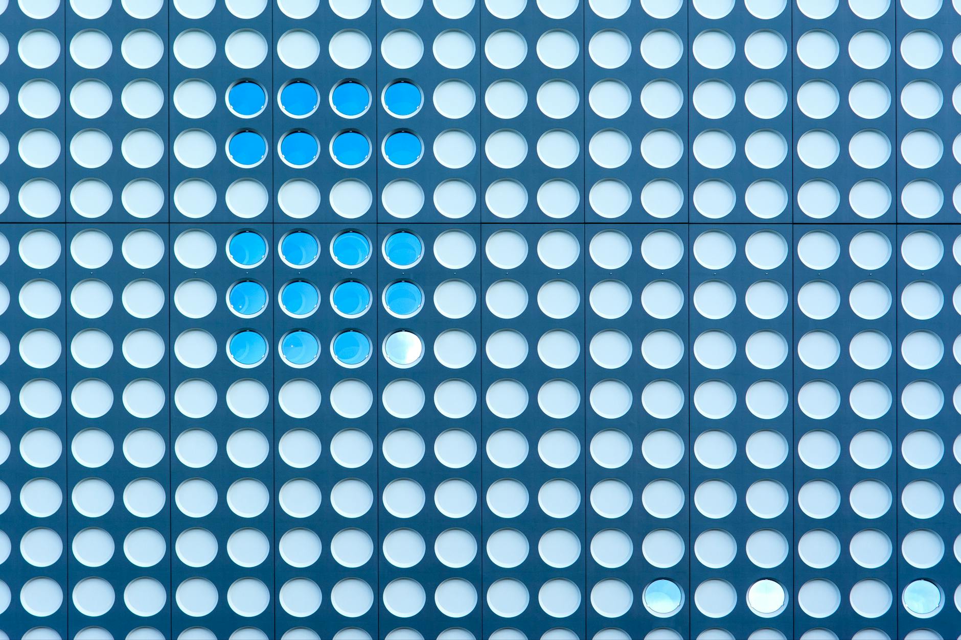 Abstract art featuring a circular pattern wall installation in Utrecht.